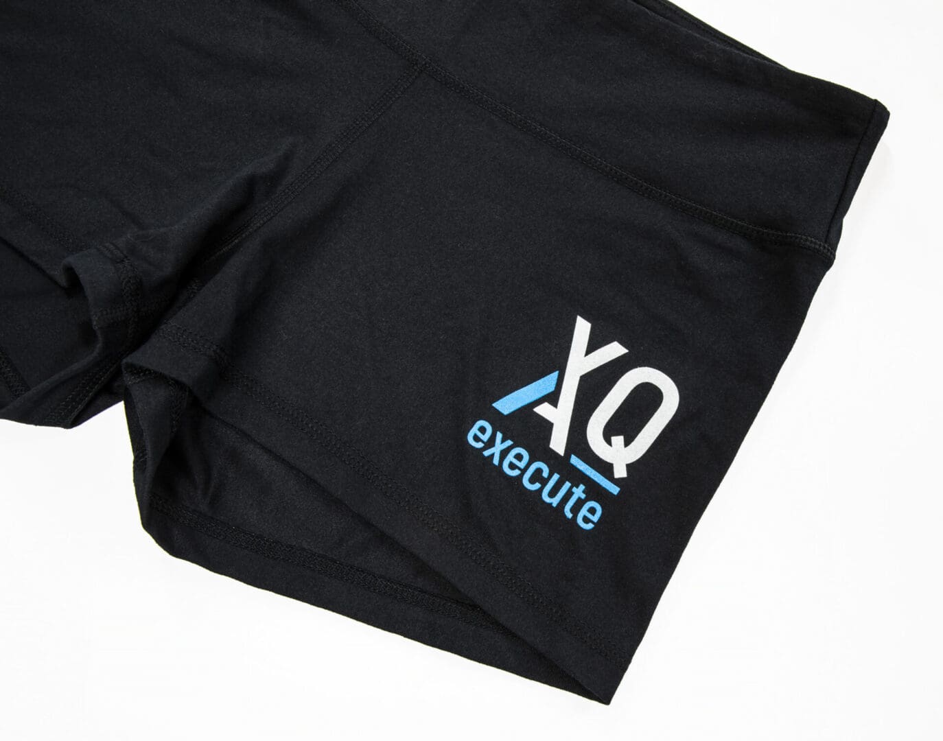 Black shorts with XQ execute logo.